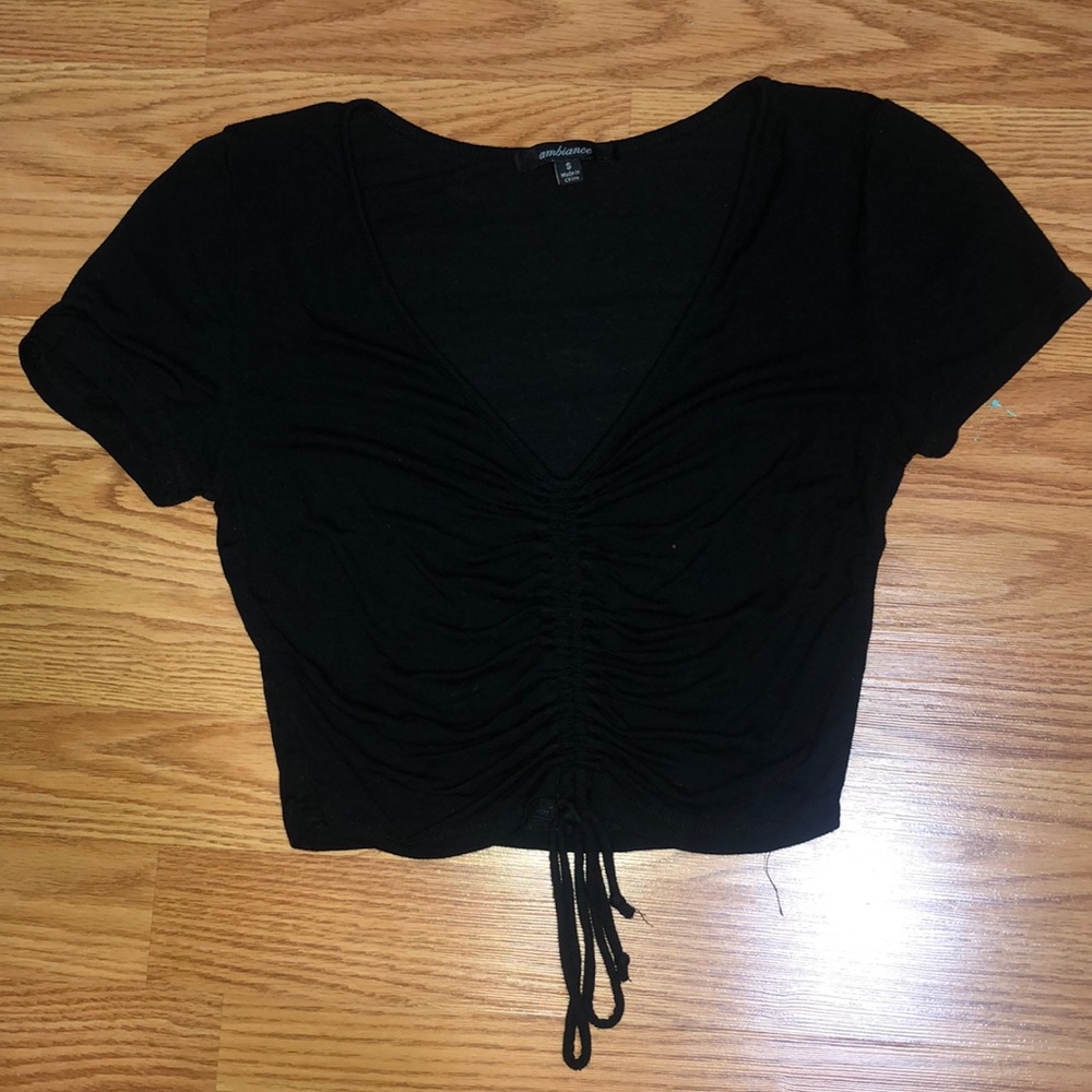black t-shirt. Cinched in the middle